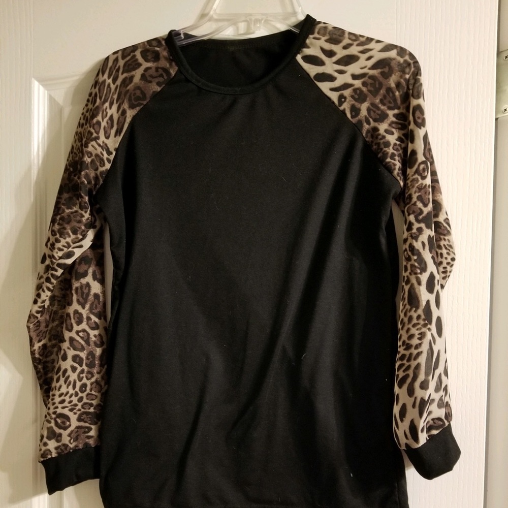 Black shirt with sheer leopard sleeves
